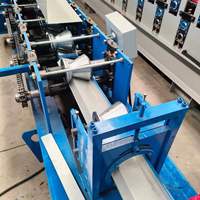 Machine de formage de rouleaux de tuiles pour pare-pluie mural