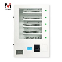 Distributeur mural de collations, de mouchoirs et de serviettes hygiéniques en métal avec monnayeur, écran LCD et écran tactile