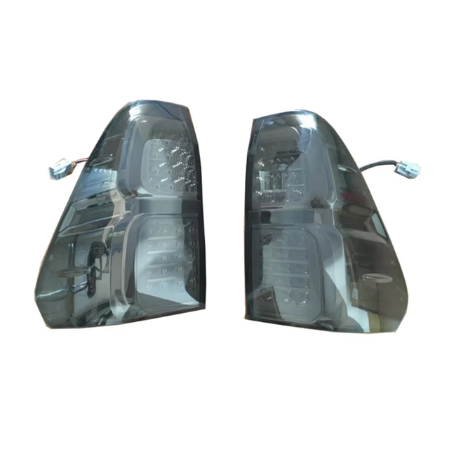 OEM LED Tail Lights for Hilux Revo 2015 Onwards Black Rear Lights with Red Lens New Condition 12V Voltage