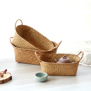 rattan, seaweed, and <b>bamboo</b> woven storage <b>baskets</b> for living room desktops, snack boxes, and cosmetic storage boxes. - Product Image 1