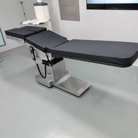 Table d'examen gynécologique hydraulique réglable pour hôpital, clinique, salle d'opération, fourniture médicale en gros OEM