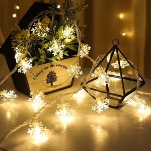 Led Snowflake String Lights Decorate The Room On Christmas Day - Product Image 1
