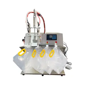 Halbautomatische Doppelkopf-Betriebsplatte Abfüllmaschine für flüssiges Öl Milch Saft Honig Wasser für Auslaufbeutel