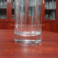Bouteilles en verre transparentes cylindriques de 70 cl pour whisky, vodka et spiritueux à vendre