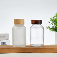 Capsule scellée étanche à la lumière médecine pilule bouteille en verre en gros clair/givré 150ml 200ml soins de santé Capsule partie bouteille en verre