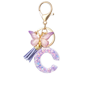 Llavero de Resina con 26 Letras, Borla de Estrella Morada, Colgante para Bolso de Mujer, Accesorio Decorativo de Moda para Mochila Escolar de Estudiantes - Product Image 3
