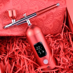 Kit de aerógrafo ABS versátil con compresor compacto de alimentación por gravedad y tipo pistón para maquillaje de uñas pastel arte tatuajes corporales - Product Image 1