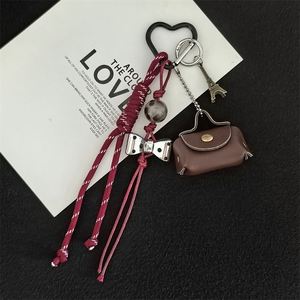 Hot-selling Instagram-style Cute Style <b>Leather</b> Mini Bag <b>Keychain</b> Niche Pendant Creative Schoolbag Wholesale - Product Image 6