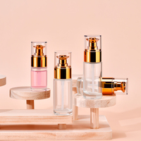 Botol Lotion Kaca Bening Mewah 20ml 30ml dengan Pompa Berlapis Emas untuk Serum Wajah, Esens, Wadah Kosmetik Perjalanan