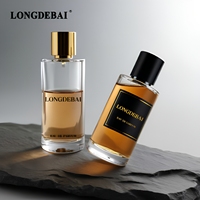 Flacon de parfum de luxe personnalisé à pression 50ml 100ml, flacon de parfum en verre 200ml, flacon de parfum rond transparent vide avec couvercle magnétique