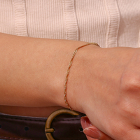 Nouvelle collection : Ensemble collier ras-du-cou et bracelet en acier inoxydable plaqué or, motif vague d'eau