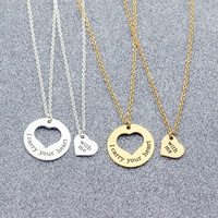 Collier tendance en acier inoxydable plaqué or 18 carats avec pendentif détachable pour famille et couple, idéal pour les occasions festives