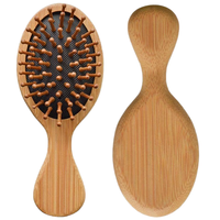 Brosse à cheveux démêlante et antistatique en bois de bambou, avec coussin de massage et technologie laser, format mini pour voyage et hôtel