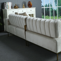 Canapé d'angle en L moderne de luxe en tissu velours écologique et durable, rembourré, avec piètement en acier inoxydable pour salon - Vente en gros usine
