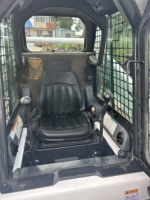 Chargeuse compacte sur pneus Bobcat S185 modèle 2020 avec joystick manuel et équipement multifonctionnel