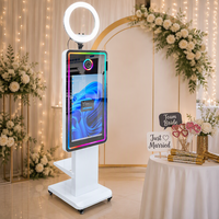 Produit phare aux États-Unis : Cabine photo miroir à écran tactile de 21,5 pouces avec éclairage RVB, compatible avec les appareils photo reflex numériques, et kit de transport en flight case