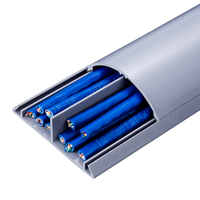 No.6 60mm/2.36 "W largeur extérieure gris en plastique Pvc câble goulotte plancher cordon couverture avec support adhésif électrique décoratif