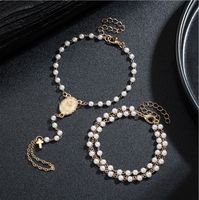 Collier chaîne multicouche en fausses perles avec breloque disque croix et chaîne de main avec bague, bijoux de mode pour femmes, vente en gros