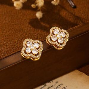 Boucles d'oreilles à clous pour femmes haut de gamme et tendance, design trèfle à quatre feuilles rotatif, polyvalentes, super brillantes, style luxe léger - Product Image 1