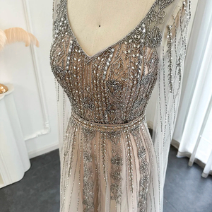 Abito <span class=keywords><strong>da</strong></span> sera in <span class=keywords><strong>argento</strong></span> nudo con maniche a mantello di lusso in cristallo Dubai <span class=keywords><strong>abiti</strong></span> formali per donne Sz069-1 per festa di <span class=keywords><strong>nozze</strong></span> - Product Image 5