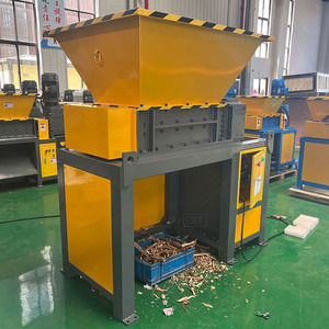 Broyeur à double arbre pour le recyclage des déchets solides, pour les pots de fleurs, les palettes <span class=keywords><strong>en</strong></span> <span class=keywords><strong>bois</strong></span>, les déchets électroniques, le plastique, le carton et les <span class=keywords><strong>vieux</strong></span> vêtements - Product Image 1