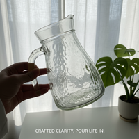 Vente en gros à l'international : Carafe transparente à motif martelé avec poignée, grande capacité, résistante à la chaleur, pour thé, café, jus, usage festif