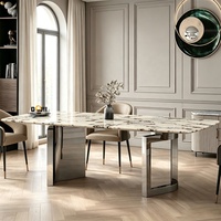 Table à manger en marbre Calacatta de style italien avec base en acier inoxydable poli miroir, 8 places, projet hôtelier Villa, OEM