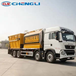 Camion pulvérisateur de granulats synchronisé Howo 8x4 avec réservoir d'asphalte de 11 000 L et réservoir de granulats de 15 000 L pour la construction routière et l'étanchéité des graviers - Product Image 4