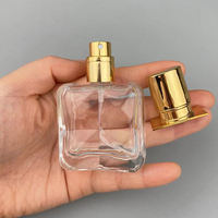Flacon de parfum en verre vide de 30 ml, transparent, carré, sérigraphié, avec pompe pulvérisatrice à couvercle doré et bouchon à vis, avec diffuseur à bâtonnets