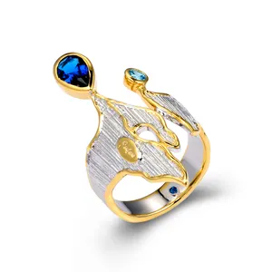 皇冠设计925纯银戒指配蓝色玻璃