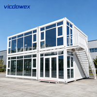VICDOWEX Maison conteneur préfabriquée modulaire à deux étages, design Asie du Sud-Est, avec murs en panneaux sandwich pour entrepôt