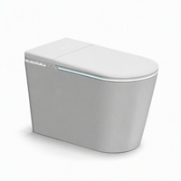 WC intelligent monobloc avec bidet électrique, couvercle à ouverture et fermeture automatiques, siège chauffant et séchage à l'air