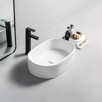 Vasque de salle de bain ovale en céramique de haute qualité, moderne, à poser sur le comptoir