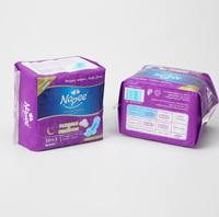 Machine d'emballage pour serviettes hygiéniques et tampons
