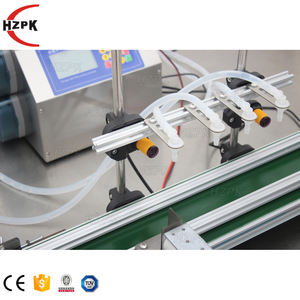 HZPK Cosmetic Water Essential Oil Bottle 4 Head Semi Automatic <strong>Liquid</strong> Filling Machine <strong>Liquid</strong> With Conveyor 330ml - Product Image 5