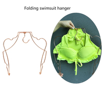 Vente en gros d'usine, cintre pliable en métal rose doré robuste pour bikinis de femmes, rangement de la salle de bain, garde-robe, haute qualité