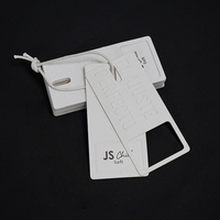 Étiquette personnalisée de marque de mode JINRUI, 400g, papier écologique, impression UV, design en relief, design convexe excitant, chaussures, sacs, vêtements haut de gamme
