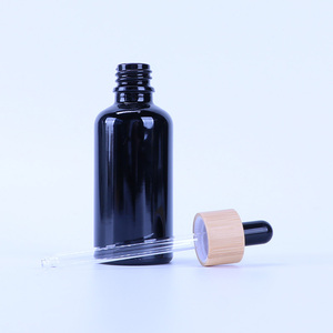 Essential Oil <b>Bottle</b> Custom Logo Black Glass <b>Dropper</b> <b>Bottle</b> For Aromatherapy Oil Cosmetics Container Empty With Rubber <b>Dropper</b> - Product Image 1