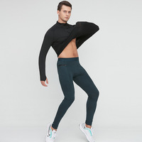 Veste de sport slim à col montant pour homme printemps-automne, idéale pour le basketball et la course, avec demi-fermeture éclair, manches longues et tissu très élastique
