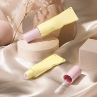 Tube de brillant à lèvres vide en forme de macaron jaune et rose avec trou pour porte-clés, flacon de gloss à lèvres compressible pour emballage de maquillage