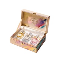 Boîte d'emballage de luxe personnalisée en forme de livre avec insert en mousse, faible MOQ, livraison rapide, pour 3 flacons de parfum avec fermeture à ruban