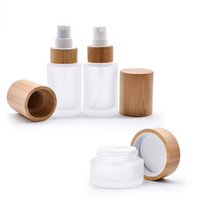 Botol Losion kaca tutup bambu kualitas tinggi 30ml 2oz botol semprot buram bening minyak esensial
