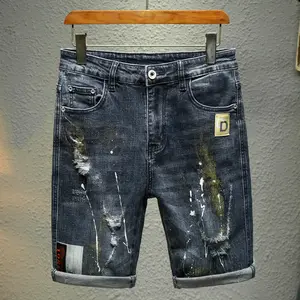 ג 'ינס הסיטונאי לגברים קרעו מכנסי הדפס ברונזה בתוספת גודל לגברים