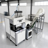 Machine de soufflage semi-automatique pour PET à faible entretien, 1500-2000 BPH, avec alimentateur automatique de préformes, fournie directement par l'usine