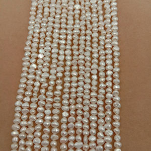 <span class=keywords><strong>4</strong></span>-5mm AA + Mini perla de agua dulce barroca suelta en hebra Venta al por mayor hebra de perlas de agua dulce - Product Image 5
