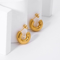Bijoux simples européens et américains vente en gros de boucles d'oreilles creuses épaisses en acier inoxydable doré boucles d'oreilles en forme de C femme