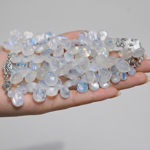 พลอยสีขาวธรรมชาติทรงลูกแพร์ขนาด 6.5 มม. น้ำหนัก 1.00 กะรัต แบบมีรอยแตก บรรจุในตัว สำหรับงานประดิษฐ์เครื่องประดับทำมือ - Product Image 5