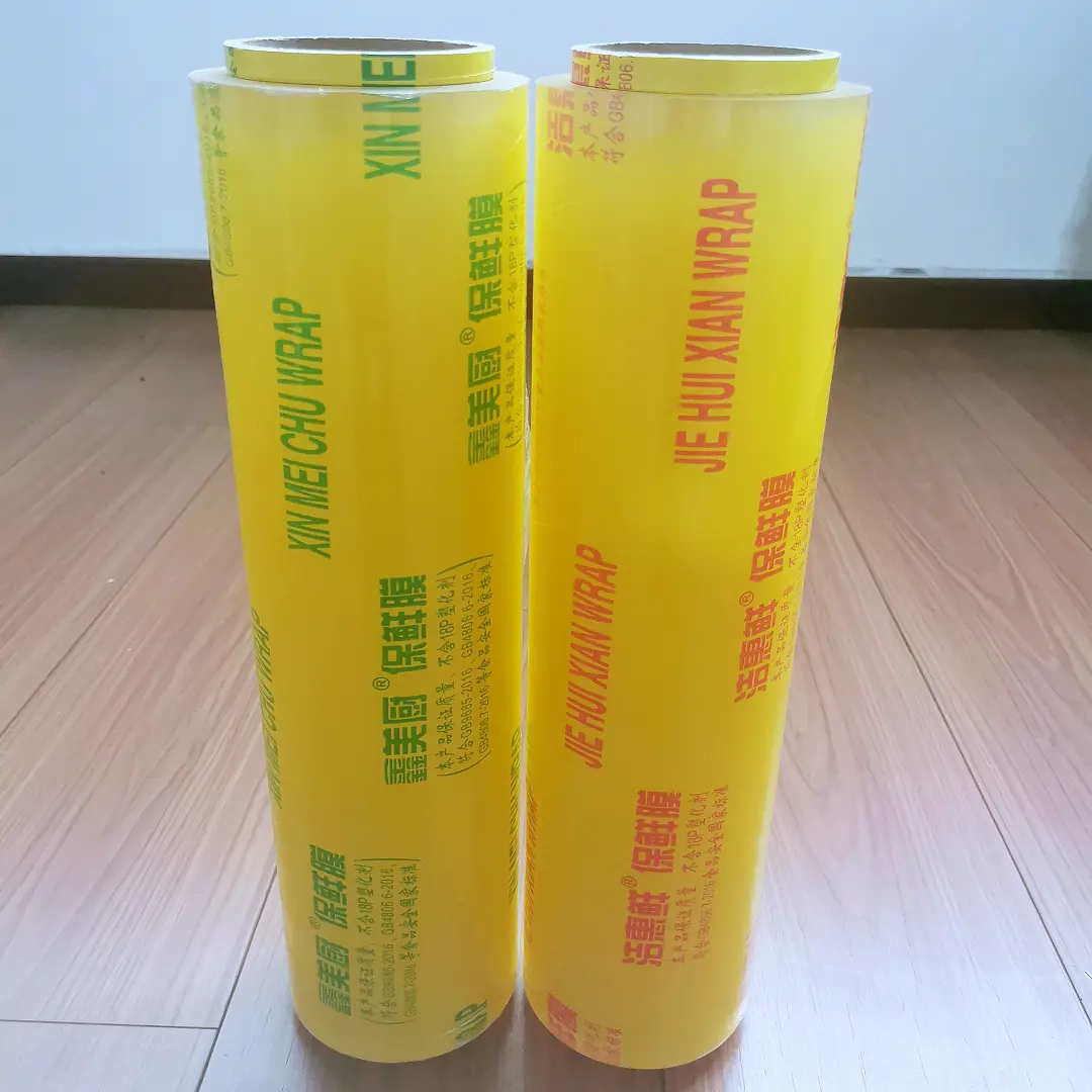 Prezzo all'ingrosso di fabbrica 35cm * 12mic PVC avvolgente pellicola trasparente in PVC pellicola morbida autoadesiva per imballaggi freschi