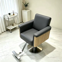 Chaise de barbier ergonomique en cuir de style moderne avec levage rotatif et repose-pieds réglable pour salons de coiffure - Vente directe d'usine