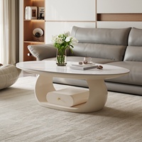 Table basse ovale moderne pour petit appartement, en bois massif avec plateau en dalle de roche, rangement intégré, mobilier de salon design, luxe léger